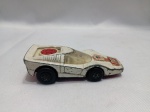 MATCHBOX - Matchbox Rolamatics Fandango branco, modelo número 35 da série Lesney, lançado por volta de 1970-1975. O brinquedo apresenta rodas pretas, uma carroceria de metal e um mecanismo de roda vermelha exposta no topo. Detalhes conforme fotos, _(ºLº)_ Caso necessite, tire todas suas dúvidas via atendimento personalizado por WhatsApp: (11) 98681-9377. Não deixe para última hora! Antecipadamente agradecemos pelo seu lance. Sem testes ou garantias futuras de originalidade, funcionalidade, material ou procedência.