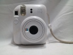 FUJIFILM - Câmera instantânea Fujifilm na cor branca. Está ligando. Sem testes de funcionamento. Detalhes conforme fotos, _(ºLº)_ Caso necessite, tire todas suas dúvidas via atendimento personalizado por WhatsApp: (11) 98681-9377. Não deixe para última hora! Antecipadamente agradecemos pelo seu lance. Sem testes ou garantias futuras de originalidade, material ou procedênci