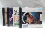 Lote com 4 CDs incluindo `Caetano Veloso` Sem Lenço sem Documento; `Seu Jorge` América Brasil; `Claudinho e Buchecha` e `Fábio Jr.` - Com Amor. Detalhes conforme fotos, _(ºLº)_ Caso necessite, tire todas suas dúvidas via atendimento personalizado por WhatsApp: (11) 98681-9377. Não deixe para última hora! Antecipadamente agradecemos pelo seu lance. Sem testes ou garantias futuras de originalidade, material ou procedência.