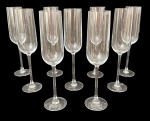 Conjunto com 9 flûtes para champagne em cristal incolor, de linhas elegantes e design contemporâneo, com bojo alongado, hastes finas e bases circulares. Peças de acabamento refinado, ideais para compor mesas sofisticadas e ocasiões especiais. Mede 25 cm.