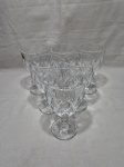 Jogo de 6 taças de água, vinho em vidro incolor ricamente moldado. Medindo 9cm x 16,5cm de altura.