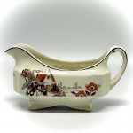 FAIANÇA - Parte de grande coleção de Molheiras - Bela molheira faiança inglesa, branca, decorada com flores policromadas e friso preto. Med. 9x17x8 cm. Marcas do tempo e desgastes. Manchas.