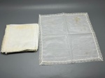 CAMA - MESA - BANHO - Lote de 22 lenços e peças finas em tecido claro com monograma bordado YSL (Yves Saint Laurent) e detalhes em renda, apresentando marcas do tempo e manchas amareladas de guarda.