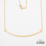 TIFFANY & Co. - Colar T Smile em Ouro Amarelo 18K - Coleção Tiffany T, 40cm de comprimento, peso de