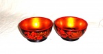 Arte contemporânea.                                                                                                        Par de Bowls em madeira da Russian.                                               Ornamentação floral.                                                                                                  Med. Alt. 05 cm. Diâm. 10,5 cm.
