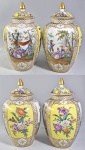 DRESDEN - Estúdio de HELENA WOLFSOHN - SÉC.XIX - Raro par de vasos cobertos em porcelana de Dresden, circa de 1880, decorados com reservas finamente pintadas a mão com flores e cenas no estilo de Jean Anthoine Watteau, representando casais românticos, emolduradas por detalhes dourados. O fundo amarelo é realçado por painéis florais também pintados à mão, característicos da decoração de alta qualidade de Dresden do final do século XIX. Marca azul Augustus Rex no fundo, do curto período de existência da manufatura (1879-1883). Itens desta manufatura são raros e ilustram o papel da oficina na continuidade das mais refinadas tradições da pintura em porcelana alemã. As peças em branco eram adquiridas de importantes manufaturas, enquanto a decoração era executada no estúdio. Med. 36 cm de altura cada. Discretos restauros na borda dos vasos. VER OUTROS --------- https://www.sellingantiques.co.uk/1157392/helena-wolfsohn-dresden-large-vase-with-lid-watteau-scenes-c1880/  -------- https://paradeantiques.co.uk/china-ceramics-glass/western/european/hand-painted-pair-thuringia-gotha-vases-c1780