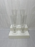 Jogo de 4 tulipas de cerveja em demicristal canelado. Medindo 7,5cm x 23cm de altura.