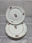 Schmidt - Jogo de 6 pratos rasos de mesa em porcelana floral com friso ouro e relevos na borda. Medindo 24,5cm de diâmetro. Desgaste no friso.