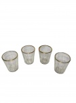 Lote com 4 copos de shot em vidro lapidado com filetes dourados nas bordas. Alguns com desgaste. -dim- 6cm de altura.