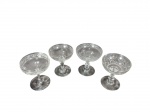 Lote composto por 4 taças no estilo coupe fabricadas em cristal. Apresentam belas decorações variadas com motivos florais e geométricos gravados. -dim- 11cm A.