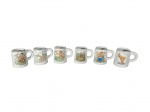 Ceramarte  | Lote composto por 6 pequenas canecas colecionáveis fabricadas em porcelana, com ilustrações de temas variados: figuras folclóricas, paisagens e animais. Friso dourado nas bordas. -dim- 6cm A.