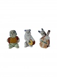 Colecionismo | Antigo conjunto composto por 3 miniaturas policromadas de porcelana  Velho Paris representando caes musicos. -dim- 5cm A.