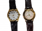 Lote com 2 relógios dourados com pulseira de couro., sendo um Dumont e outro Robert Cart no estado , precisando de revisão , sem garantia de autenticidade , estoque antigo dec 90