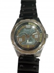 Relógio de pulso Condor Racing , caixa em metalprateador e fundo no formato de pista , pulseira de borracha , começo dos anos 2000 , funcionando.