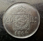 Raro Ensaio Monetário, "PEÇA ÚNICA", Metal PRATA não Catalogada, "UNIFACE", Valor 20 Reis, Módulo Menor - 24 mm, Data 1864, Acompanha Envelopes dos Antigos Colecionadores, Octavio Victor Ribeiro do Espírito Santo e do Gabinete Numismático do Dr. Solano de Barros, Apresentando um Histórico Detalhado da Peça, Certificando sua Autenticidade, Adquirida em Fevereiro de 1970, Estado de Conservação Flor de Cunho.