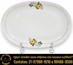 RENNER - TRAVESSA, PARTE DE SERVIÇO DE JANTAR, SÉRIE MEDAILLON, EXECUTADO EM PORCELANA ESMALTADA E VITRIFICADA RICAMENTE DECORADA COM FLORES E FOLHAS EM DELICADA POLICROMIA, NA TÉCNICA DITA DECALQUE, BORDA FILETADA, MEDINDO 29,5 X 20 CM. APRESENTA MARCAS DO TEMPO, USO, DESGASTES E/OU IMPERFEIÇÕES COMPATÍVEIS COM SUA UTILIZAÇÃO E ESTADO DE CONSERVAÇÃO, CONFORME FOTOS EXTRAS. ESCLAREÇA TODAS AS DÚVIDAS ANTES DE EFETUAR SEU LANCE, QUE SERÁ CONSIDERADO IRREVOGÁVEL E IRRETRATÁVEL. CONSULTE PREVIAMENTE OS TERMOS E CONDIÇÕES DISPONÍVEIS NO SITE. CONTATO VIA TELEFONE OU WHATSAPP: (21) 98264-3000. TEMOS OUTRAS PEÇAS DESTE MESMO MODELO NOS LOTES Nº 59, 121, 188, 263, 266 E 349.