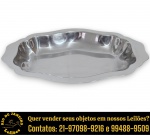 WOLFF - TRAVESSA, PARTE DE SERVIÇO DE MESA, EXECUTADA EM AÇO INOXIDÁVEL, APRESENTANDO FORMATO OITAVADO TRABALHADO COM GOMOS, COM BORDAS ONDULADAS, ALÇAS LATERAIS INTEGRADAS, MEDINDO 4 X 34 X 23 CM. APRESENTA MARCAS DO TEMPO, USO, DESGASTES E/OU IMPERFEIÇÕES COMPATÍVEIS COM SUA UTILIZAÇÃO E ESTADO DE CONSERVAÇÃO, CONFORME FOTOS EXTRAS. ESCLAREÇA TODAS AS DÚVIDAS ANTES DE EFETUAR SEU LANCE, QUE SERÁ CONSIDERADO IRREVOGÁVEL E IRRETRATÁVEL. CONSULTE PREVIAMENTE OS TERMOS E CONDIÇÕES DISPONÍVEIS NO SITE. CONTATO VIA TELEFONE OU WHATSAPP: (21) 98264-3000.
