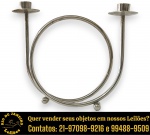CASTIÇAL DE MESA EXECUTADO EM METAL CROMADO, APRESENTANDO FORMATO ESPIRALADO COM SUPORTE PARA DUAS VELAS E PÉS DE APOIO ESFÉRICOS, MEDINDO 25 CM. APRESENTA MARCAS DO TEMPO, USO, DESGASTES E/OU IMPERFEIÇÕES COMPATÍVEIS COM SUA UTILIZAÇÃO E ESTADO DE CONSERVAÇÃO, CONFORME FOTOS EXTRAS. ESCLAREÇA TODAS AS DÚVIDAS ANTES DE EFETUAR SEU LANCE, QUE SERÁ CONSIDERADO IRREVOGÁVEL E IRRETRATÁVEL. CONSULTE PREVIAMENTE OS TERMOS E CONDIÇÕES DISPONÍVEIS NO SITE. CONTATO VIA TELEFONE OU WHATSAPP: (21) 98264-3000.