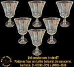 CONJUNTO DE TAÇAS EXECUTADAS EM DEMI-CRISTAL, APRESENTANDO BOJO EM FORMATO DE TULIPA LEVEMENTE ABERTO, DECORADO COM LAPIDAÇÃO GEOMÉTRICA EM GOMOS VERTICAIS, HASTE CURTA TORNEADA COM ANÉIS EM RELEVO SOBRE BASE CIRCULAR, COMPOSTO POR SEIS PEÇAS, MEDINDO 9,5 X 5 CM CADA. APRESENTAM MARCAS DO TEMPO, USO, DESGASTES E/OU IMPERFEIÇÕES COMPATÍVEIS COM SUA UTILIZAÇÃO E ESTADO DE CONSERVAÇÃO, CONFORME FOTOS EXTRAS. ESCLAREÇA TODAS AS DÚVIDAS ANTES DE EFETUAR SEU LANCE, QUE SERÁ CONSIDERADO IRREVOGÁVEL E IRRETRATÁVEL. CONSULTE PREVIAMENTE OS TERMOS E CONDIÇÕES DISPONÍVEIS NO SITE. CONTATO VIA TELEFONE OU WHATSAPP: (21) 98264-3000.