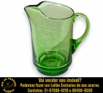 JARRA EXECUTADA EM GROSSO VIDRO COLORIDO DESTACANDO SILHUETA CILÍNDRICA, COMPLEMENTADA POR BICO VERTEDOR MOLDADO E ALÇA ERGONÔMICA, BASE ESPESSA E MACIÇA, MEDINDO 19,5 X 19 X 13 CM. APRESENTA MARCAS DO TEMPO, USO, DESGASTES E/OU IMPERFEIÇÕES COMPATÍVEIS COM SUA UTILIZAÇÃO E ESTADO DE CONSERVAÇÃO, CONFORME FOTOS EXTRAS. ESCLAREÇA TODAS AS DÚVIDAS ANTES DE EFETUAR SEU LANCE, QUE SERÁ CONSIDERADO IRREVOGÁVEL E IRRETRATÁVEL. CONSULTE PREVIAMENTE OS TERMOS E CONDIÇÕES DISPONÍVEIS NO SITE. CONTATO VIA TELEFONE OU WHATSAPP: (21) 98264-3000.