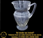 JARRA EXECUTADA EM DEMI-CRISTAL, APRESENTANDO CORPO BOJUDO APOIADO SOBRE PÉ CIRCULAR, DECORADO COM LAPIDAÇÃO GEOMÉTRICA EM GOMOS VERTICAIS, BOCAL LARGO EVERTIDO COM BICO VERTEDOR E ALÇA INTEGRADA , MEDINDO 21,5 X 16 X 12 CM. APRESENTA MARCAS DO TEMPO, USO, DESGASTES E/OU IMPERFEIÇÕES COMPATÍVEIS COM SUA UTILIZAÇÃO E ESTADO DE CONSERVAÇÃO, CONFORME FOTOS EXTRAS. ESCLAREÇA TODAS AS DÚVIDAS ANTES DE EFETUAR SEU LANCE, QUE SERÁ CONSIDERADO IRREVOGÁVEL E IRRETRATÁVEL. CONSULTE PREVIAMENTE OS TERMOS E CONDIÇÕES DISPONÍVEIS NO SITE. CONTATO VIA TELEFONE OU WHATSAPP: (21) 98264-3000.
