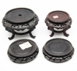 Lote composto de 4 peanhas em madeira. Altura e diâmetro: 7,5 x 11cm / 9 x 15cm / 3,5 x 11cm.