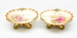 ROYAL WORCESTER - Par de fruteiras em porcelana esmaltada e vitrificada. Med: Alt 09cm / diâmetro 22cm  (apresenta restauro e trincados)(no estado)