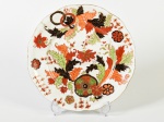 RENNER - Prato raso decorativo em porcelana esmaltada e vitrificada, decorado com motivos florais da linha ROMANTIQUE. Diâmetro 25cm.