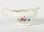 REAL - Molheira em porcelana esmaltada e vitrificada, decorada com motivos florais. Medidas: 10 x 20 x 11cm.