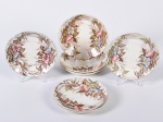 H.B. & Cie- Conjunto constando 07 pires em faiança francesa decoração floral.