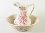 MYOTT SON & CO - Antigo conjunto de gomil e bacia em faiança inglesa esmaltada e vitrificada, decorados com motivos florais. Bacia apresenta fio de cabelo e trincados. Altura do gomil: 32cm; Altura e diâmetro da bacia: 9 x 43cm.