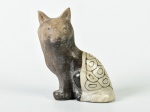 Escultura em cerâmica representando cachorro. Assinada na base. Altura: 14cm.
