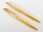 PARKER - Par de antigas canetas parker 51 esferográficas, modelo MkIII, em metal dourado.
