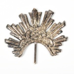 Resplendor em metal. Medidas: 6 x 6,5cm.