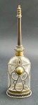 Incensário trabalhado com frasco de vidro e metal, no estilo oriental. Medidas: 24 x 8 cm.