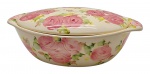WEISS - Terrina oval em cerâmica esmaltada marfim adornada com coloridos motivos florais e vegetalistas. Medidas: 35 x 12 cm. Ínfimos bicados na borda; pega da tampa ausente; tampa com bicado.