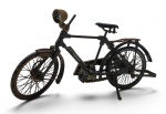 BICICLETA DECORATIVA - Antiga miniatura de bicicleta decorativa, em metal com pneus de borracha. Medida: 29cm aproximadamente. Observação: Ausência de guidão, oxidação em diversas parte, marcas e desgastes.