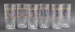 Conjunto composto por 06 copos cilíndricos long drink em cristal translúcido, adornados com motivos frutais e geométricos, e moldados com ranhuras espiraladas na base. Medidas: 15 x 7 cm.