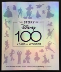 livro - The Story of Disney: 100 Years of Wonder -  John Baxter, Bruce C. Steele and Staff of the Walt Disney Archives - Disney Editions - 2023 - idioma inglês - 304 p. - capa dura com sobrecapa e parte interna em excelente estado de conservação - (28,5X23,5)cm.
