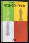 livro - Reencontros: contos - Altino Machado - Bookmix Comunicações - 2006 - 213 p. - dedicatória com autógrafo do autor na primeira folha - brochura com capa e miolo em bom estado de conservação - (21X14) cm.