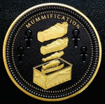 Moeda Ilhas Salomão - 50 Cents 2024 - 38gr - 45mm - Níquel Preto e Revestimento seletivo de Ouro - Séries: Egito Antigo - Mumificação - Rei Charles III - Com Certificado.