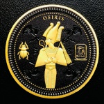 Moeda Ilhas Salomão - 50 Cents 2024 - 38gr - 45mm - Níquel Preto e Revestimento seletivo de Ouro - Séries: Egito Antigo - Osiris - Rei Charles III - Com Certificado.