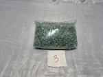 Lote de aproximadamente 650 gramas de pedras verdes para decoração.