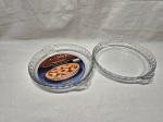 Par de travessas redondas em vidro temperado. Medindo 25cm x 5cm de altura.