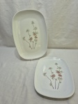 Par de travessas retangulares em melanina Goyana floral. Medindo 36cm x 26cm; 31cm x 22cm. Desgaste na peça.