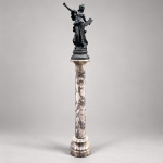 AUGUSTE MOREAU (18341917)  LA PATRIE. Medindo: x  cm.Escultura alegórica francesa em liga metálica patinada, representando figura feminina com livro aberto inscrito LA PATRIE, assentada sobre coluna torneada em mármore brechado policromado. Auguste Moreau, escultor francês nascido em Dijon, integrou a conhecida família Moreau e expôs no Salon de Paris a partir de 1861, destacando-se por figuras e composições alegóricas.(Coluna apresenta pontos com lascados conforme imagens evidenciam)