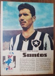 Página de Época Colecionável - Ídolos do Futebol Brasileiro: Nilton Santos (Botafogo) - Anos 1950/1960Descrição: Raríssima e histórica página original de época da célebre seção "Ídolos do Futebol Brasileiro", publicada pela Revista O Cruzeiro. O item apresenta uma belíssima fotografia colorida em página inteira do lendário lateral-esquerdo Nilton Santos com a camisa clássica do Botafogo de Futebol e Regatas, acompanhada de um detalhado texto autobiográfico em formato de depoimento em primeira pessoa na parte inferior (com ilustração do Pato Donald jornalista). Item autêntico e genuíno, indispensável para colecionadores de memorabília do futebol brasileiro, torcedores do Botafogo ou para enquadramento decorativo de alto nível. Produto em papel (não é cópia ou reprodução)