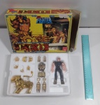 Boneco na caixa franquia Os Cavaleiros do Zodíaco (Saint Seiya) Pararelo de época St. Fighter