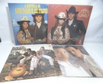 Disco de Vinil LP - Conjunto com 4 LPs, incluindo a novela Ana Raio e Zé Trovão, o intérprete Chitãozinho & Xororó e LPs de intérpretes diversos, em bom estado.