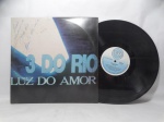Disco de Vinil LP - `Luz do Amor`, com 3 do Rio, em bom estado. Capa autografada.